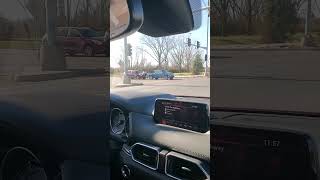 Men Stand Between Cars For an Improvised Towing