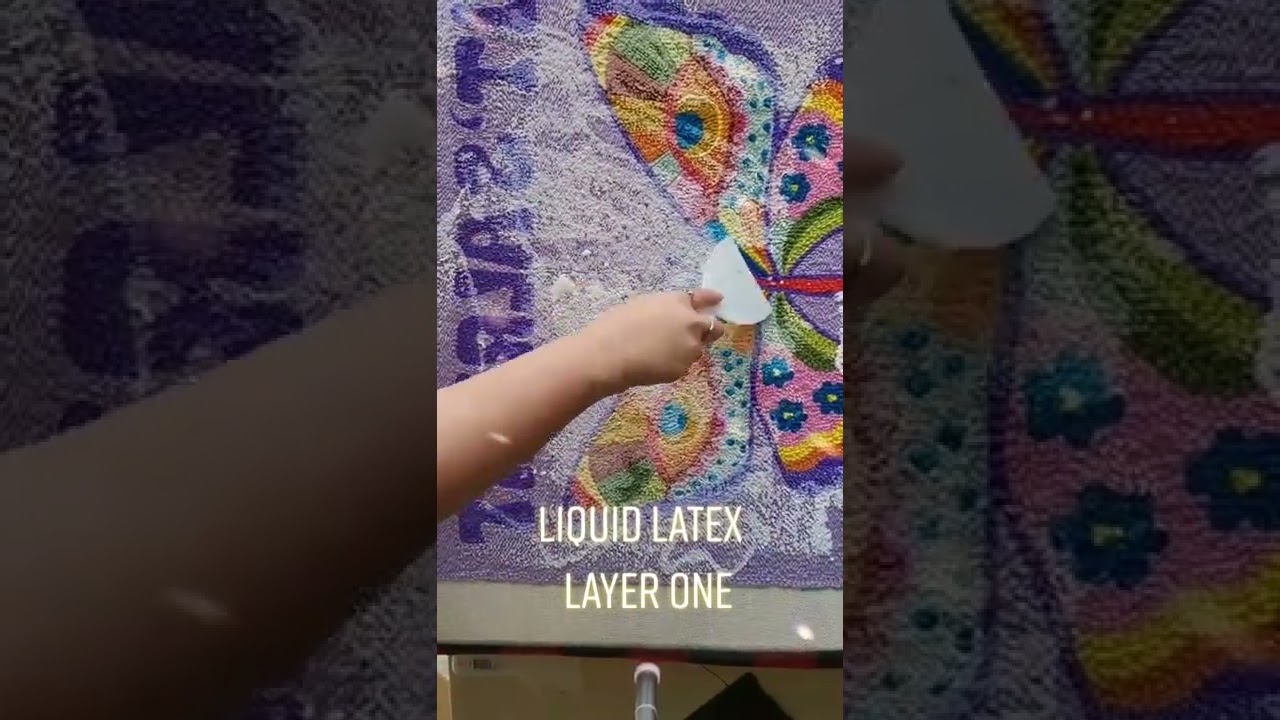 Applying latex adhesive to rugs made with a tufting gun 