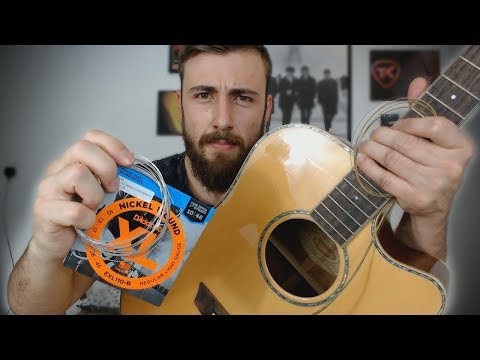 Vídeo: Com Lligar Una Corda De Guitarra