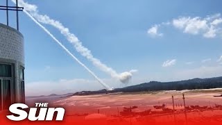 China launches LIVE FIRE drills 12 miles from Taiwan as troops 'shoot at drones'