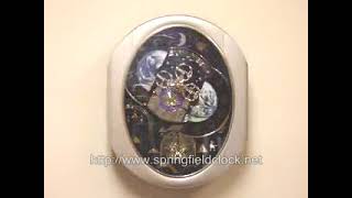 Peaceful Cosmos Rhythm Magic Motion Clock 4MH751AR19