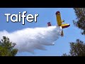Canadair aircrafts low pass water drops during wildfire