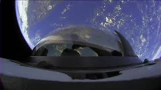 ChrisSembroski capturing pictures from orbit through Dragon’s cupola