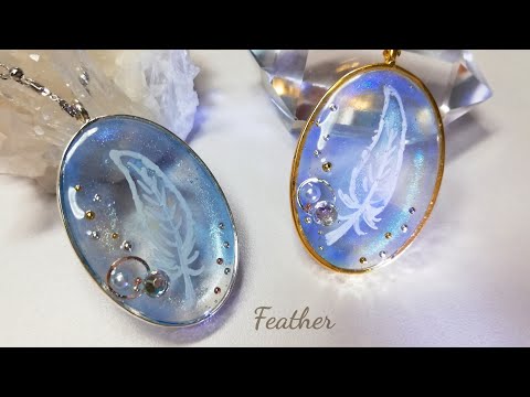 レジン໒꒱· ﾟサクラ デコレーゼ使用✨天空に舞う羽根ペンダント