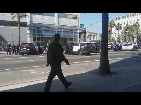 a crazy man and so many police in LA.The man yell