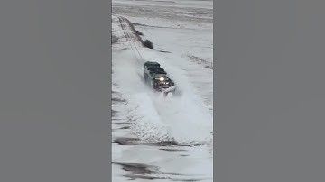 Train passing through snow