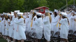 BHS Class of 2015 toss caps into the air