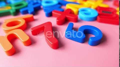 Colorful Plastic Letters on Pink Background, Close Up | Stock Footage - Envato elements