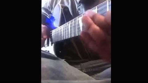 Pick squeal / pinch harmonic / artificial harmonic.  Tutorial.