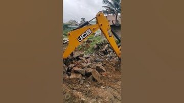 JCB 2DX STONE CLEANING WITH BACK BUCKET.