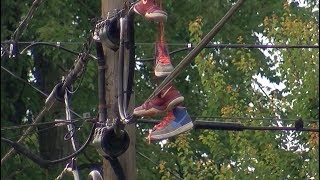 Shoes Hanging On Power Lines