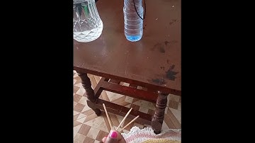 How to suspend a water bottle using 3 toothpicks.