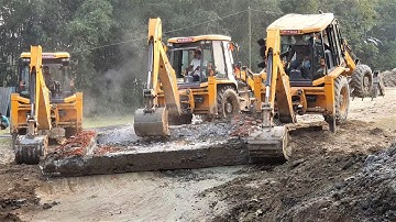 3 JCB Backhoe Machine Pulling and Throwing Out Heavy Concrete Slab - Working For Road Construction