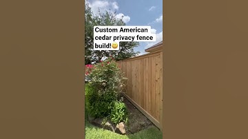 Custom American cedar privacy fence with decorative cedar cap & trim!