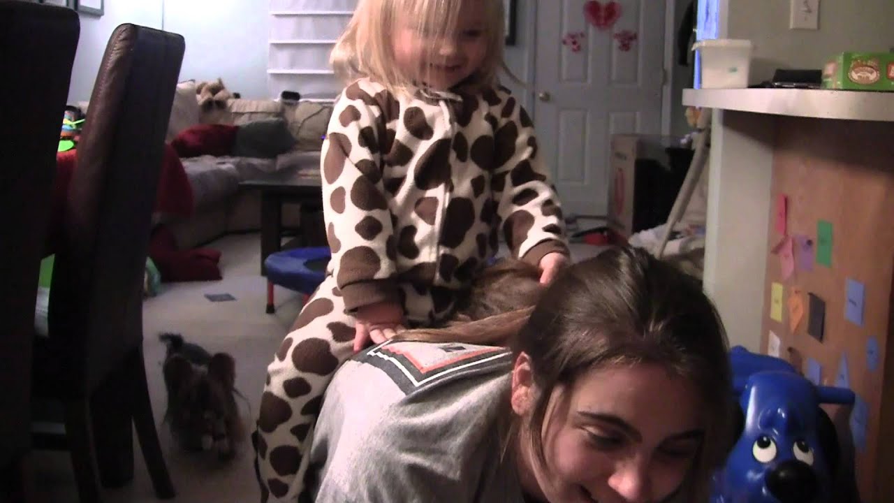 2011 02 25 Ellie riding on Mommy the Horse