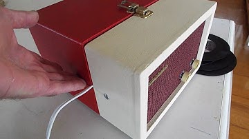 Crescemt 45 RPM record player playing a couple 45