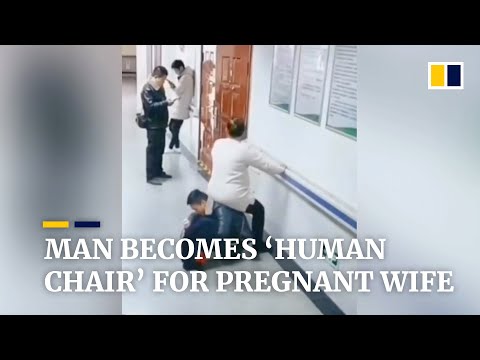 Chinese man becomes ‘human chair’ for pregnant wife