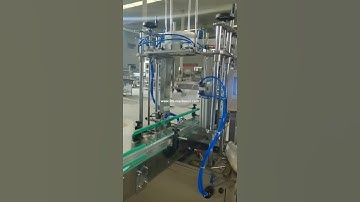 Automatic bucket pail drum bottle lid placing feeding top pressing sealing machine