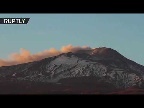 Plumes of smoke over mount Etna in Sicily