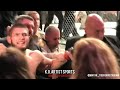 KHABIB SCREAMS AT IRISH FANS CAGESIDE RESTRAINED AFTER JUMPING DANIS!