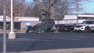 Car crashes, rolls over into into parking lot of First Free Church