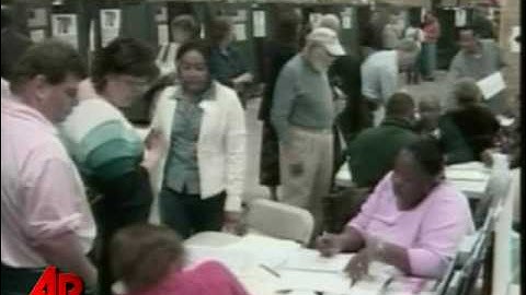 Raw Video: Polls Open to Long Lines in NYC