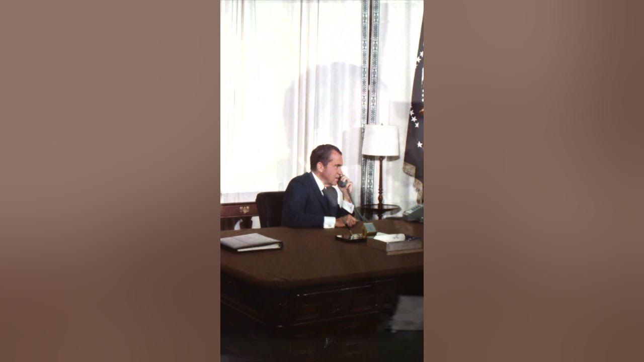 How did president nixon talk on a landline to the astronauts on the