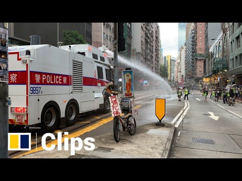 Police water cannon charge in Hong Kong