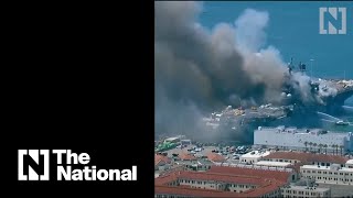 At least 21 injured in fire aboard ship at naval base in US