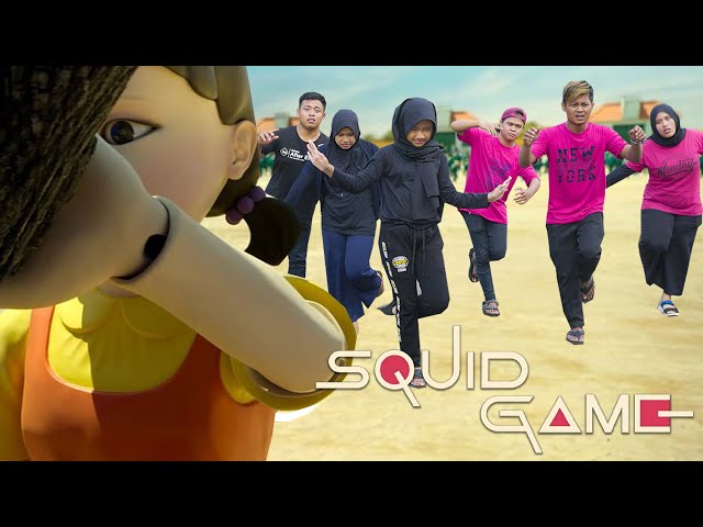 Squid Game Berjalan Dengan Satu Kaki class=