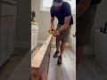 Dewalt hand held planer in action.