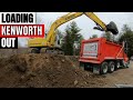 Loading Dirt with a Kobelco Excavator in a Kenworth T800 Dump Truck