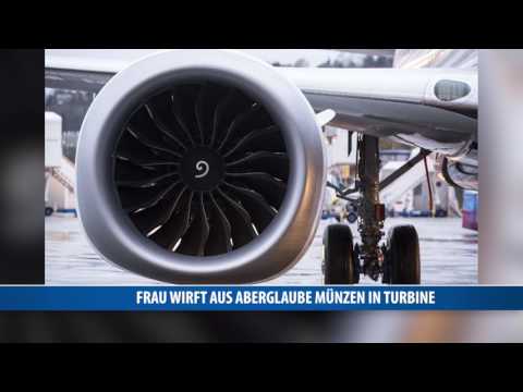 Video: Eine Frau Wirft Münzen In Die Turbine Des Flugzeugs
