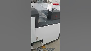 Stitching and folding machine