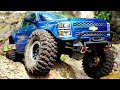 Traxxas Trx4 Vs Axial Scx10 ii Crawling Battle!