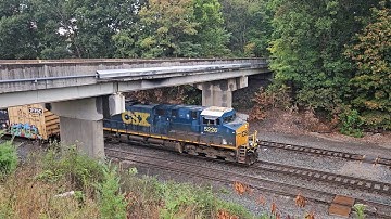 CSX freight train with good power variety slowly enters Cumberland Yard