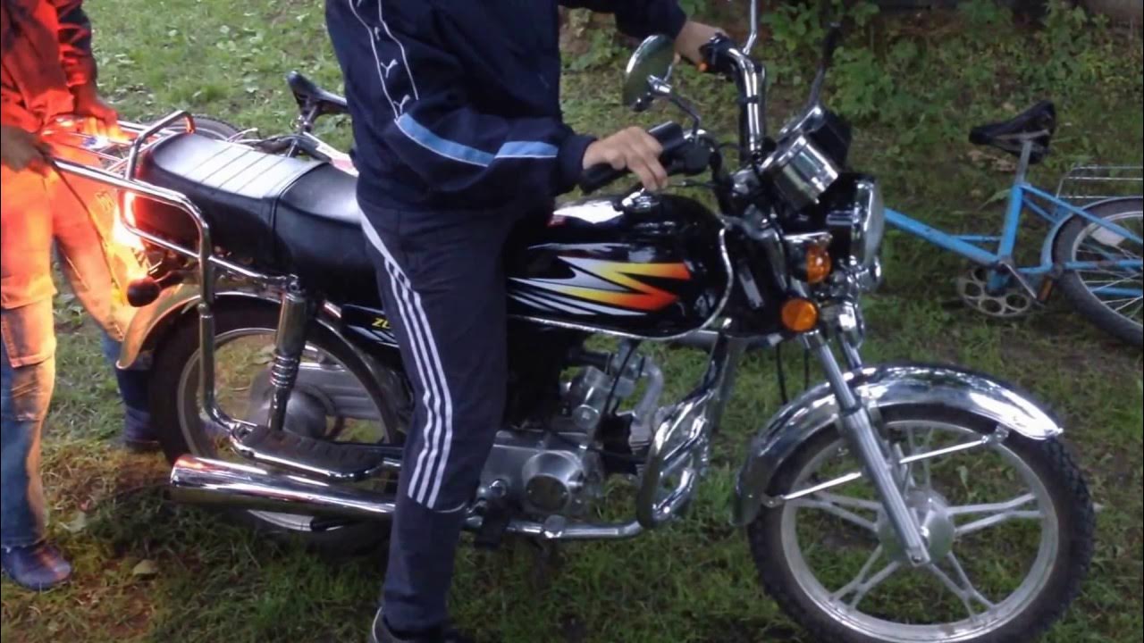 Пацан на мотоцикле Альфа