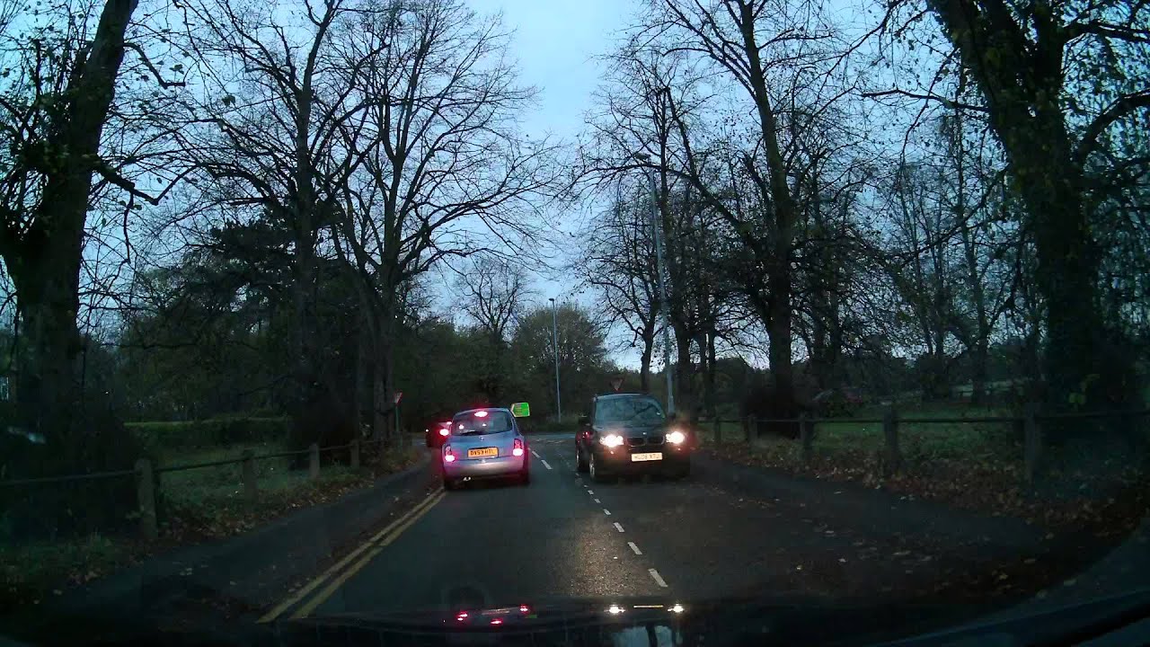 HG06 XTJ On the phone driving wrong way down a one way street - YouTube