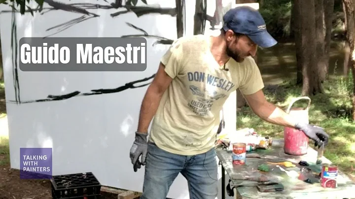 Guido Maestri talks with Maria Stoljar while paint...