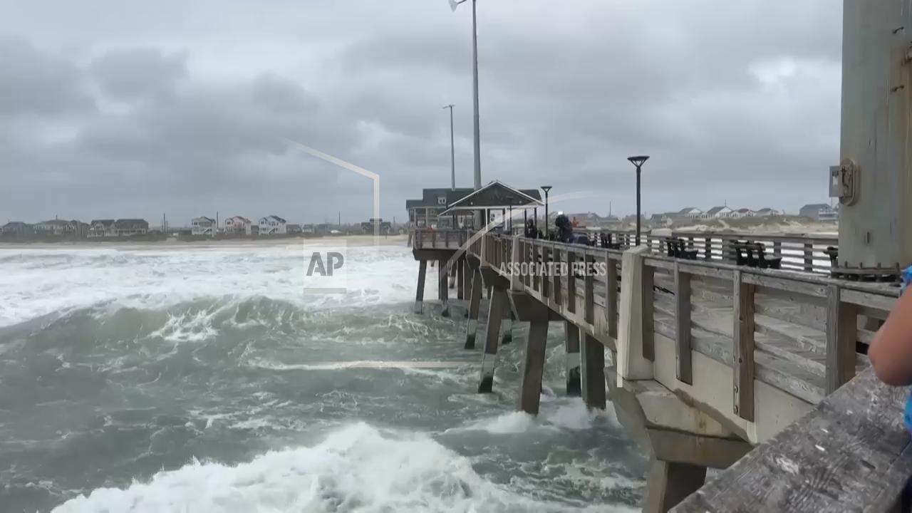 Hurricane Erin pounds North Carolina's coast with strong waves and gusty winds