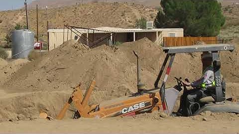 Skip Loader Grader Work By operator Dan Garrison