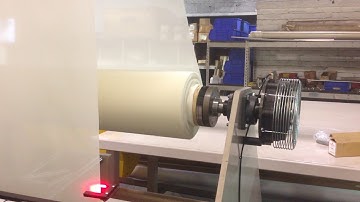 Edge guided center unwinder