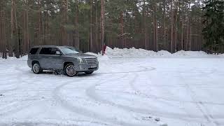 Cadillac Escalade snow drift. Donuts.