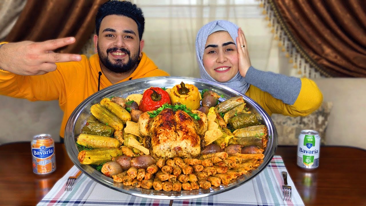 تحدي اكل المحشي مع فرخة محشية ارز 👈 العقاب في البلكونة 😔