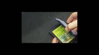 Resetting a bent McDonald's Snivy holo #pokemon #pokemoncards Resetting a bent McDonald's Snivy holo #pokemon #pokemoncards
