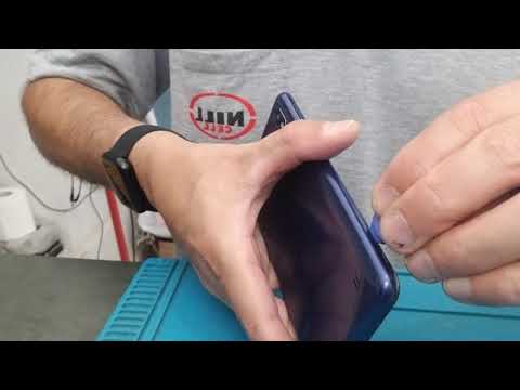 Vídeo: Como Desmontar A Capa Do Telefone