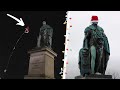 Putting a Santa Hat on a Famous Statue