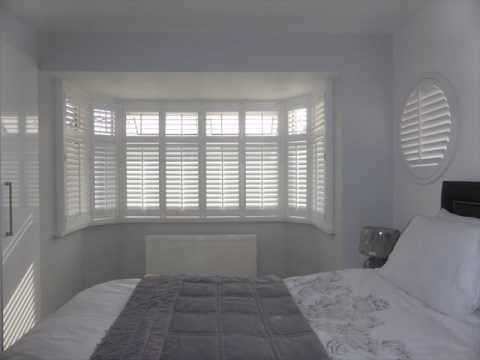 White Wooden Shutters For Bay Windows