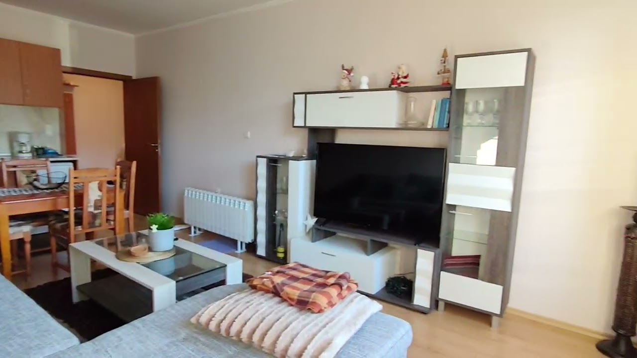 Обзаведен двустаен апартамент за продажба в жилищна сграда до лифта в гр.Банско