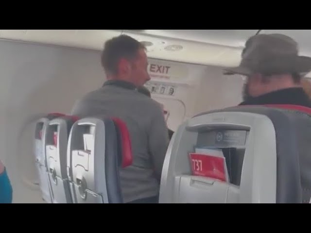 Video Man Allegedly Tries To Open Door Mid Flight